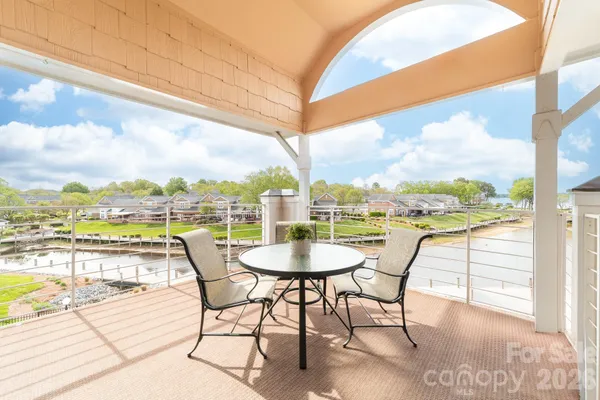 a view of a swimming pool with a terrace