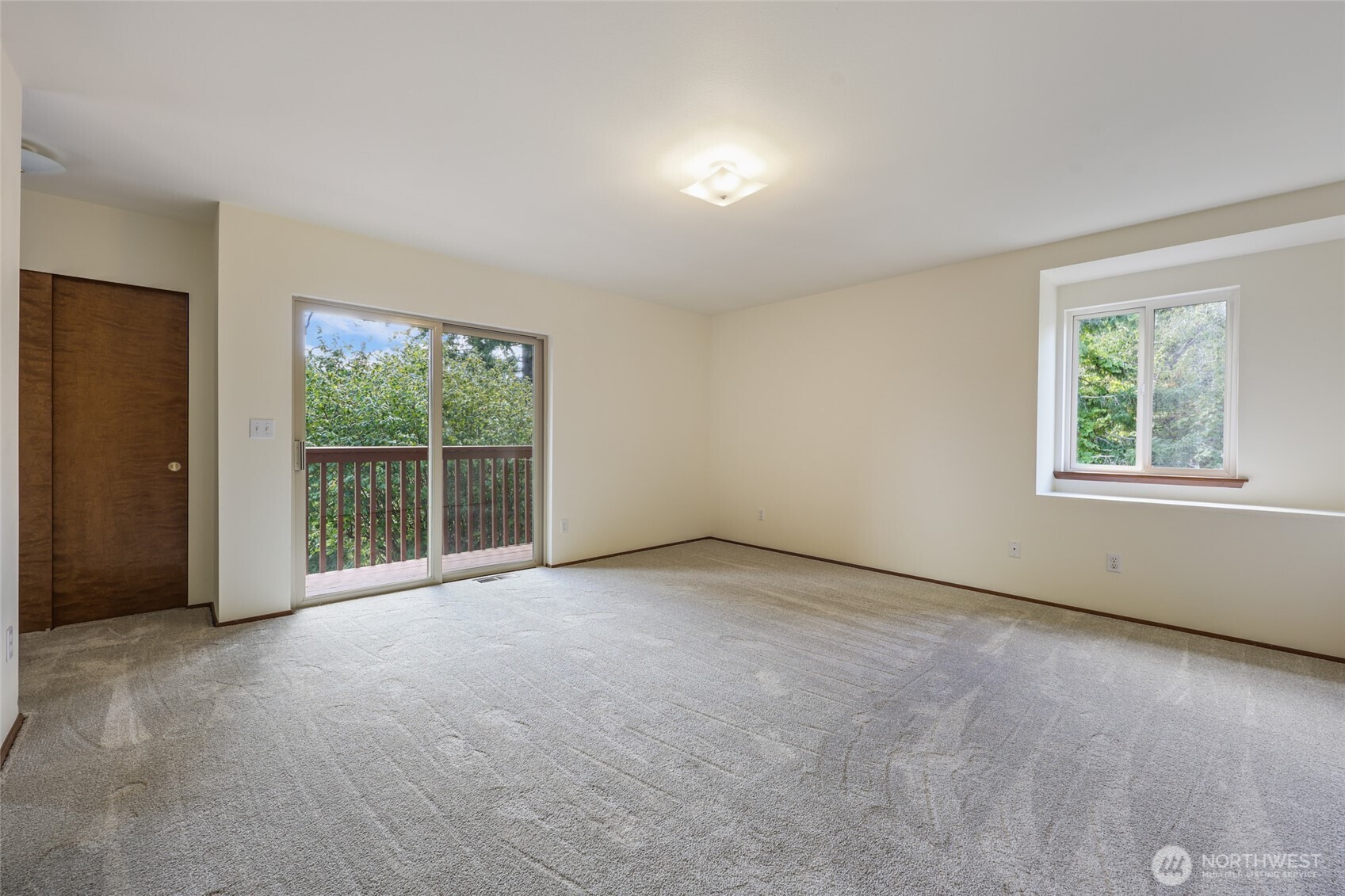 7922 Ellison Loop Northwest Olympia, WA 98502 - Photo 20 of 40 an empty room with windows