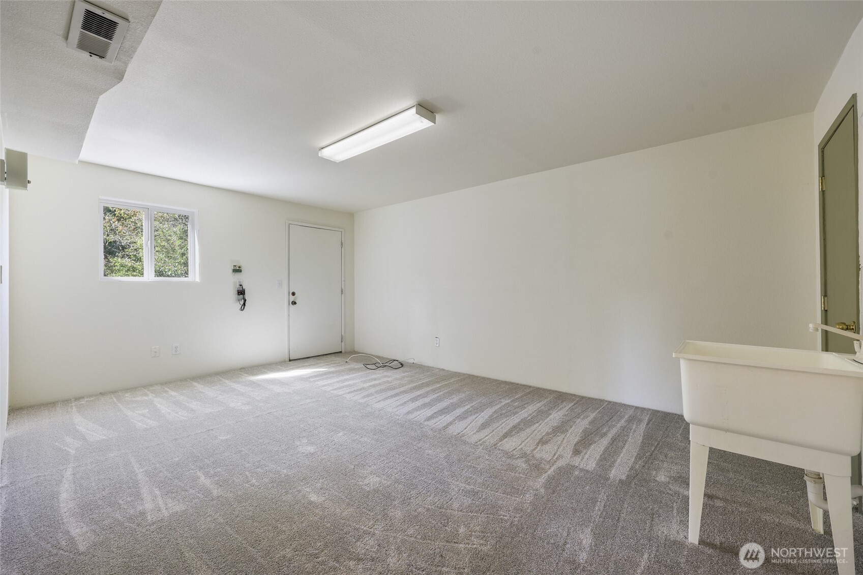 7922 Ellison Loop Northwest Olympia, WA 98502 - Photo 29 of 40 a view of an empty room with a window