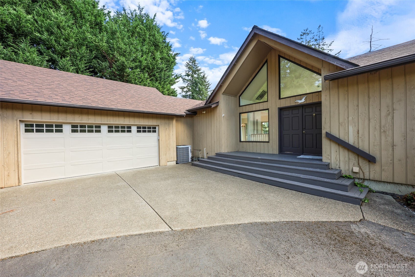 7922 Ellison Loop Northwest Olympia, WA 98502 - Photo 30 of 40 a view of a house with a yard