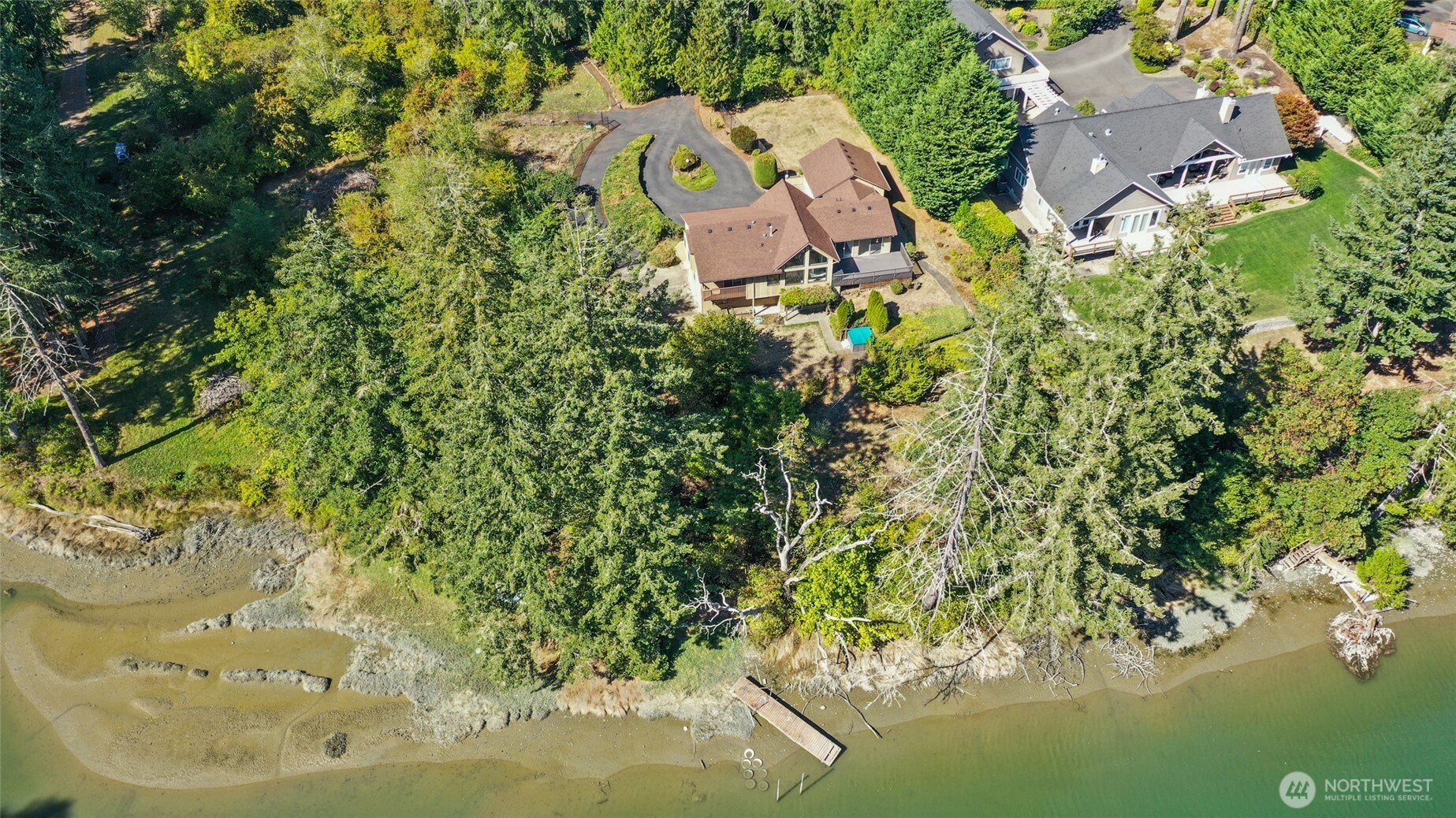 7922 Ellison Loop Northwest Olympia, WA 98502 - Photo 37 of 40 an aerial view of a house with a yard swimming pool and outdoor seating