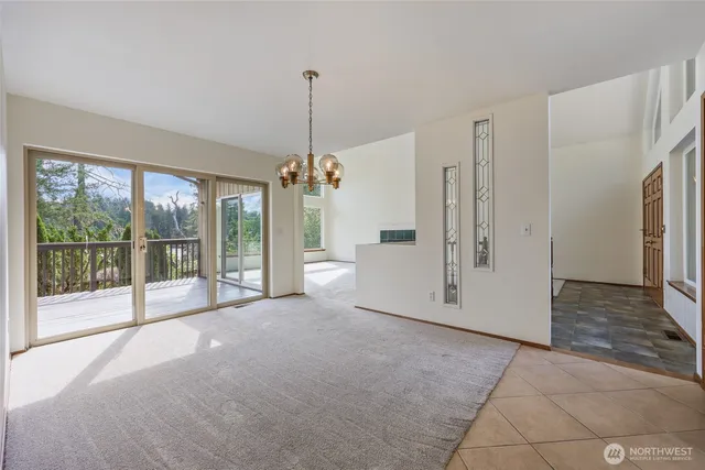 a view of a room with large windows