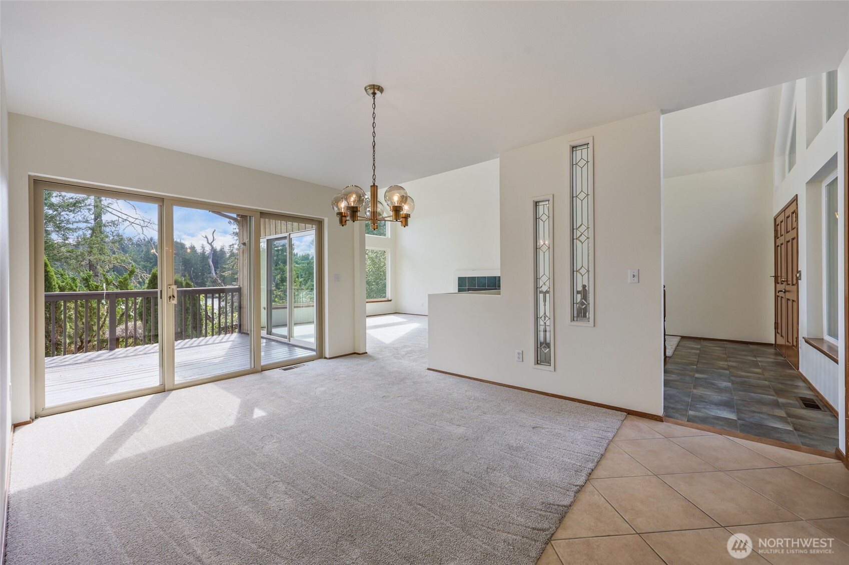 7922 Ellison Loop Northwest Olympia, WA 98502 - Photo 4 of 40 a view of a room with large windows