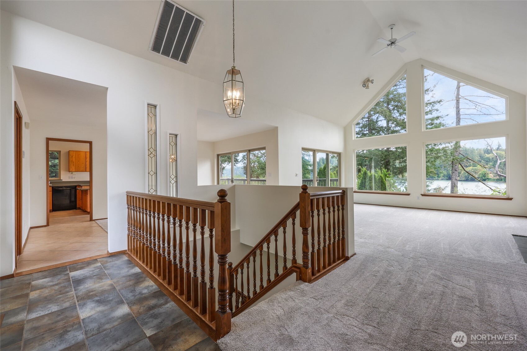 7922 Ellison Loop Northwest Olympia, WA 98502 - Photo 5 of 40 a view of a hallway with bedroom and balcony