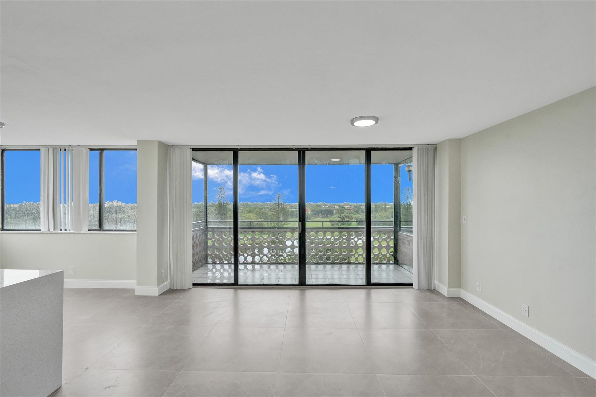 4222 Inverrary Boulevard, Unit 4810 Lauderhill, FL 33319 - Photo 18 of 63 wooden floor in an empty room with a window
