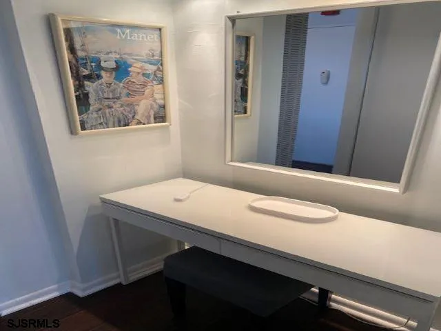 a bathroom with a shower and a toilet