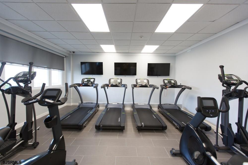 9400 Atlantic Avenue, Unit 912 Margate City, NJ 08402 - Photo 20 of 31 a view of a room with gym equipment