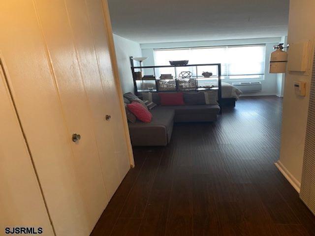 9400 Atlantic Avenue, Unit 912 Margate City, NJ 08402 - Photo 4 of 31 a living room with furniture and a window