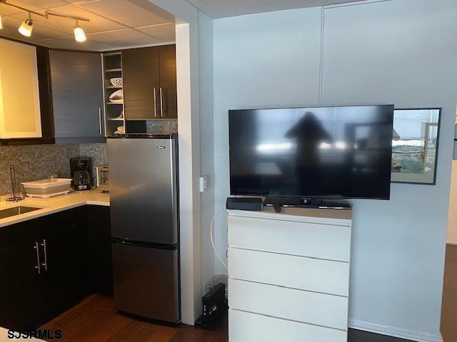 9400 Atlantic Avenue, Unit 912 Margate City, NJ 08402 - Photo 10 of 31 a kitchen with stainless steel appliances a refrigerator and a stove top oven