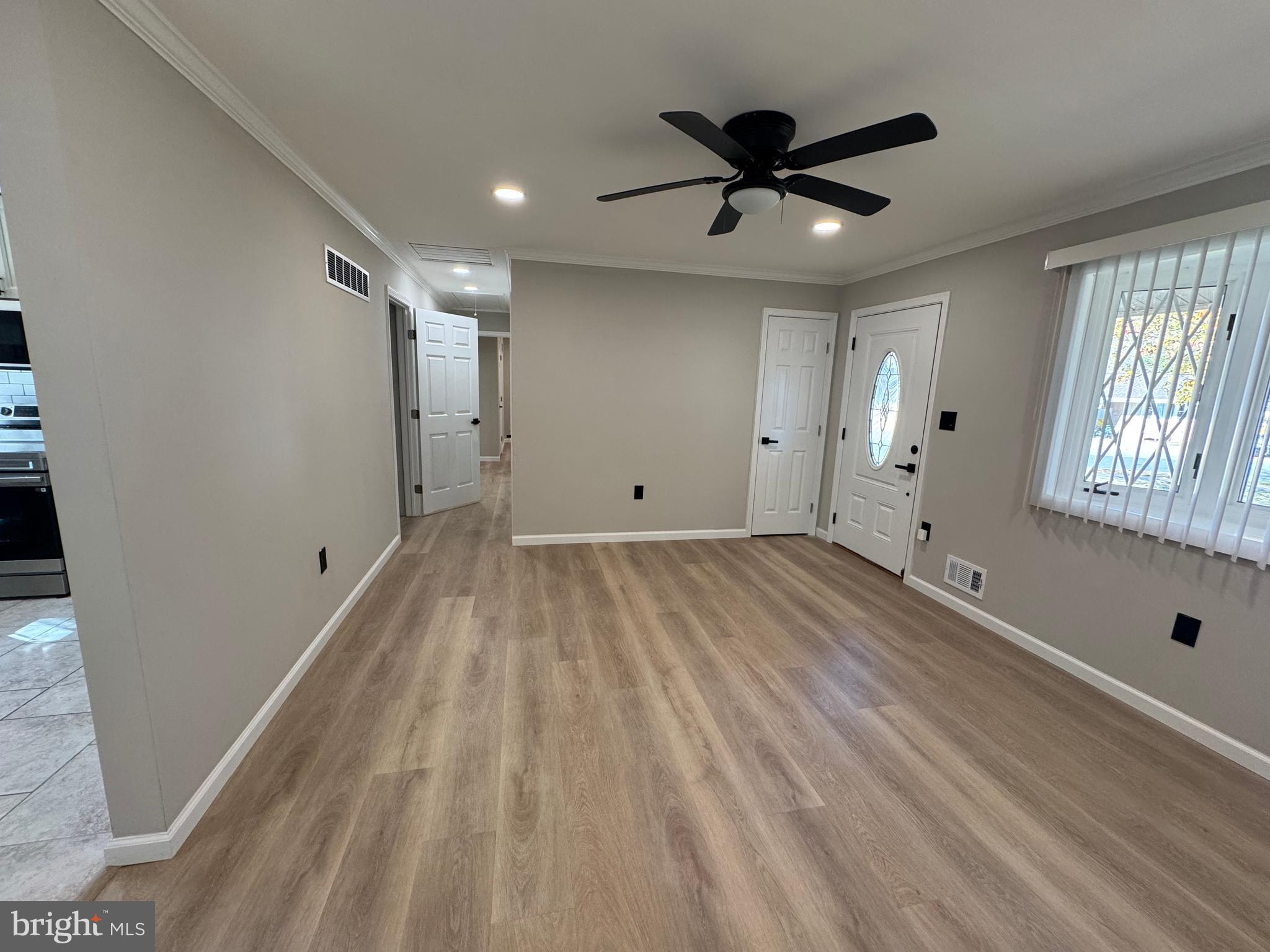 602 Eliot Road Pasadena, MD 21122 - Photo 16 of 30 a view of an empty room with a window