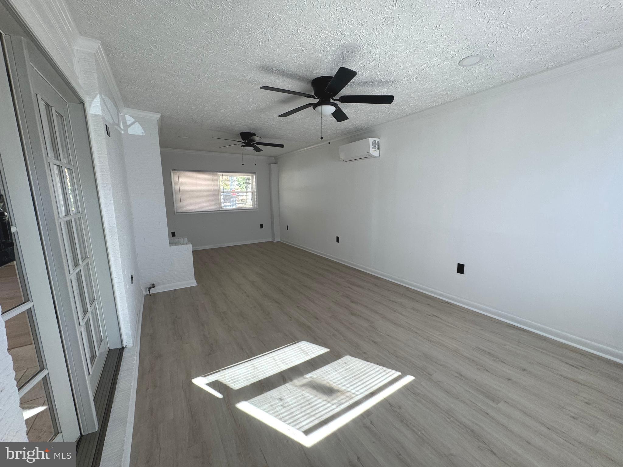 602 Eliot Road Pasadena, MD 21122 - Photo 9 of 30 a view of an empty room