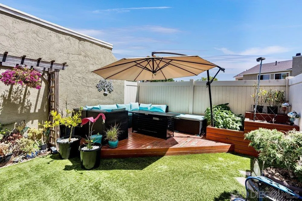13358 Birch Tree Lane Poway, CA 92064 - Photo 9 of 16 a view of a house with backyard sitting area and swimming pool