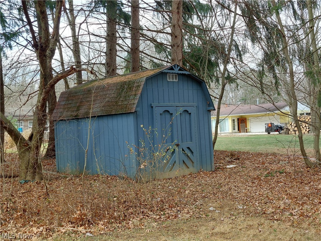 757 Center Road New Franklin, OH 44319 - Photo 26 of 26 There is a shed in the back of the yard allowing for easy storage of lawn equipment.