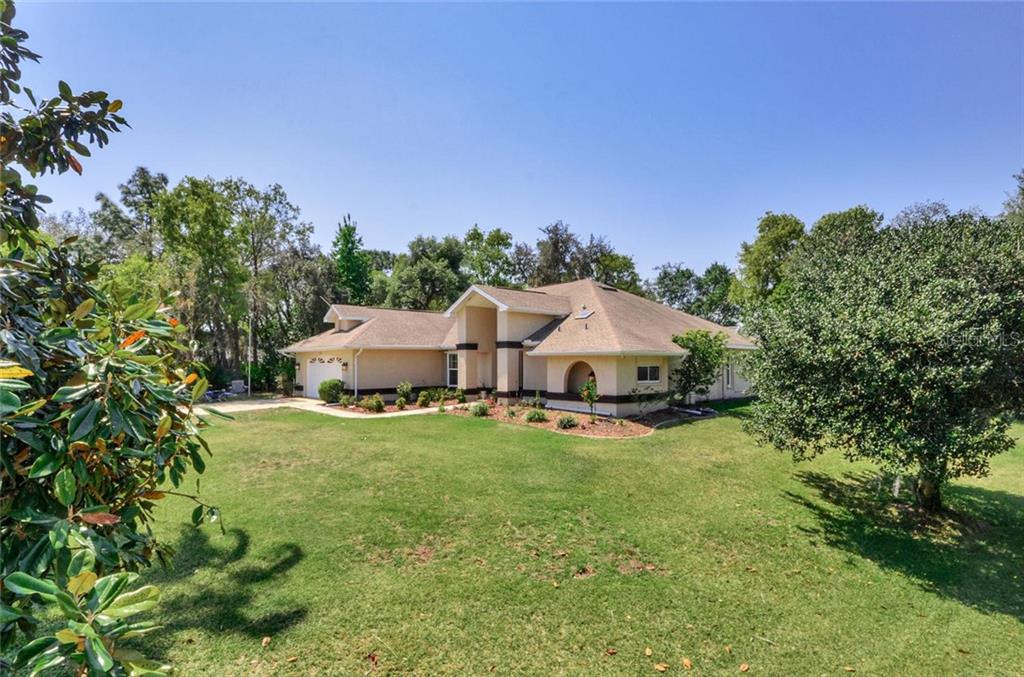 9241 Nightingale Road Weeki Wachee, FL 34613 - Photo 1 of 1 Beautiful Home on Corner Lot