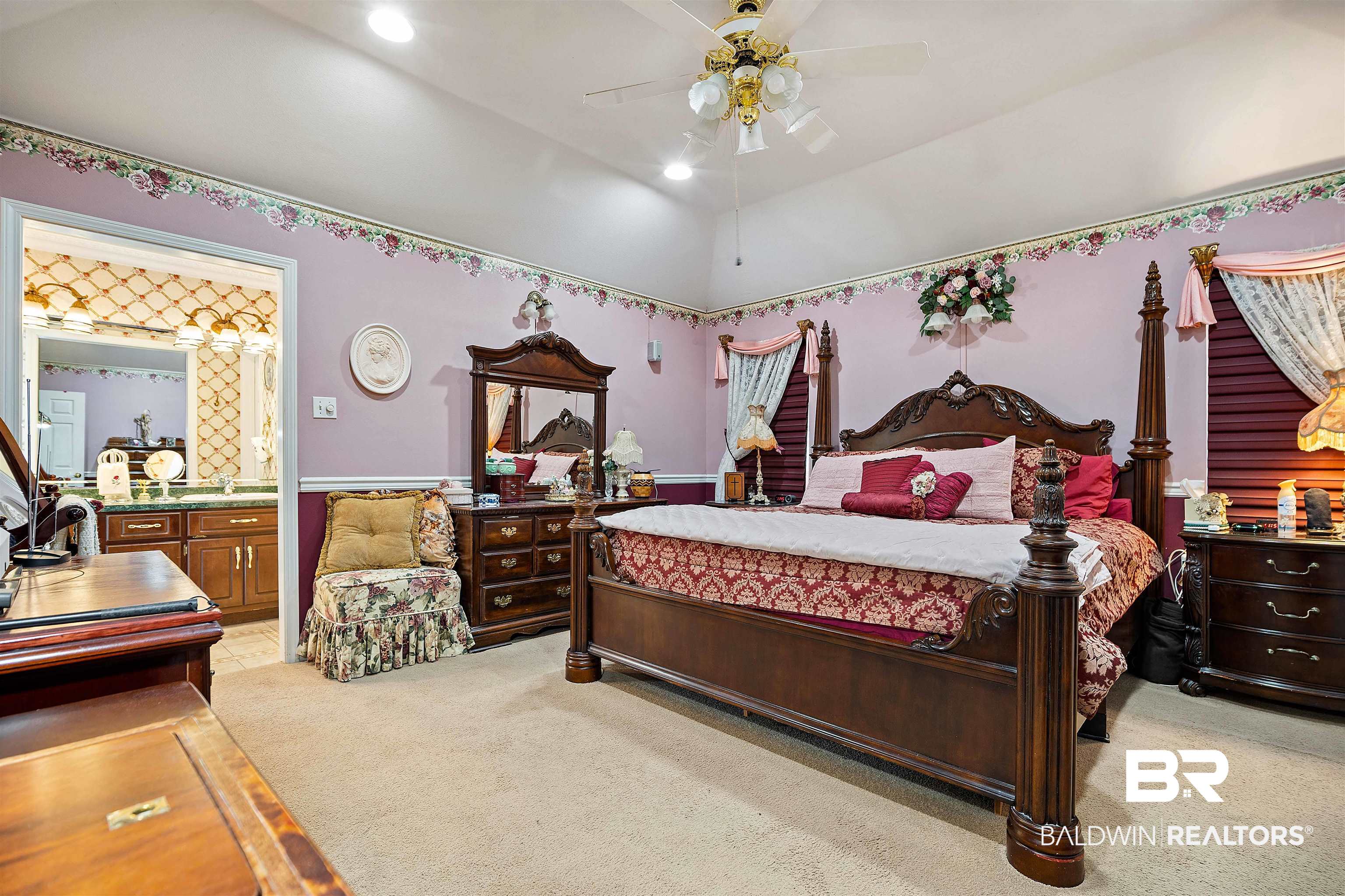 1744 Aden Road Mobile, AL 36695 - Photo 16 of 35 Carpeted bedroom featuring lofted ceiling, connected bathroom, and ceiling fan