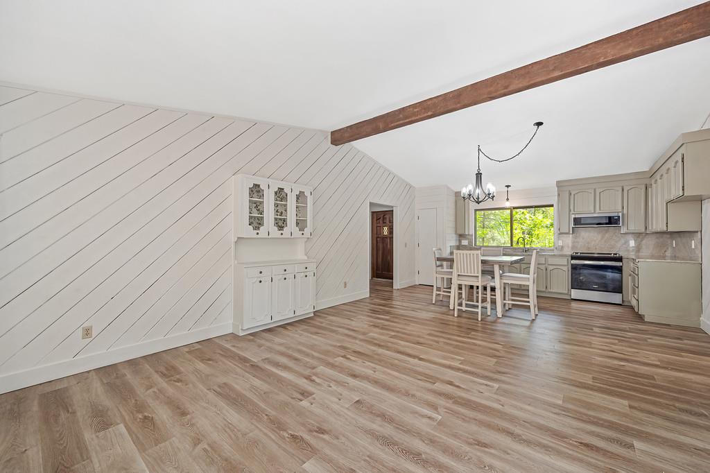 15358 Sky Pines Road Grass Valley, CA 95949 - Photo 6 of 37 Luxury vinyl flooring. Built-in coffee bar with storage.