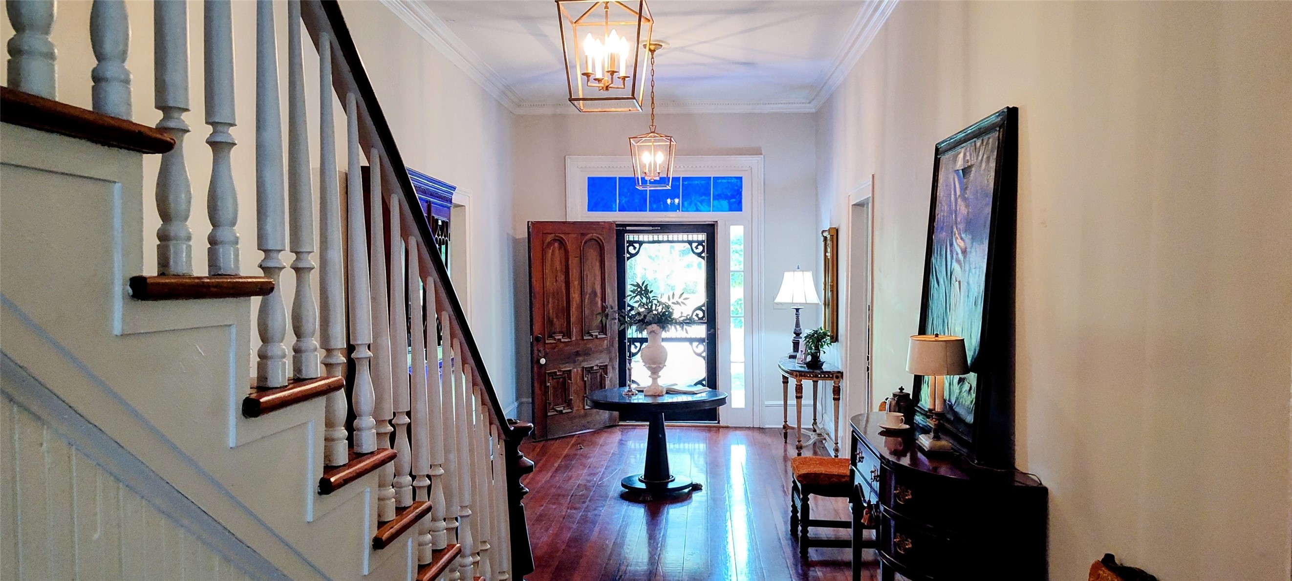 414 Spring Street Washington, GA 30673 - Photo 5 of 42 a view of a hallway with wooden floor and entryway