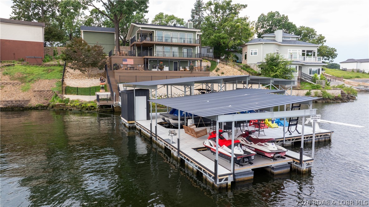 5590 Alona Point Osage Beach, MO 65065 - Photo 1 of 46 Large concrete dock with enclosed bar/storage, 2 b