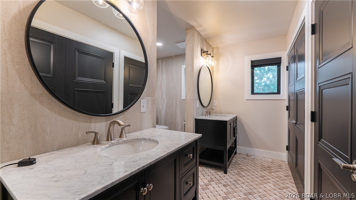 5590 Alona Point Osage Beach, MO 65065 - Photo 17 of 46 Master Bathroom is masterfully designed with dual