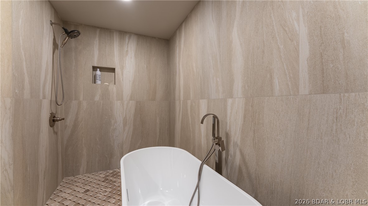 5590 Alona Point Osage Beach, MO 65065 - Photo 18 of 46 Master Bathroom "wet room" features 3ft X 3ft tile