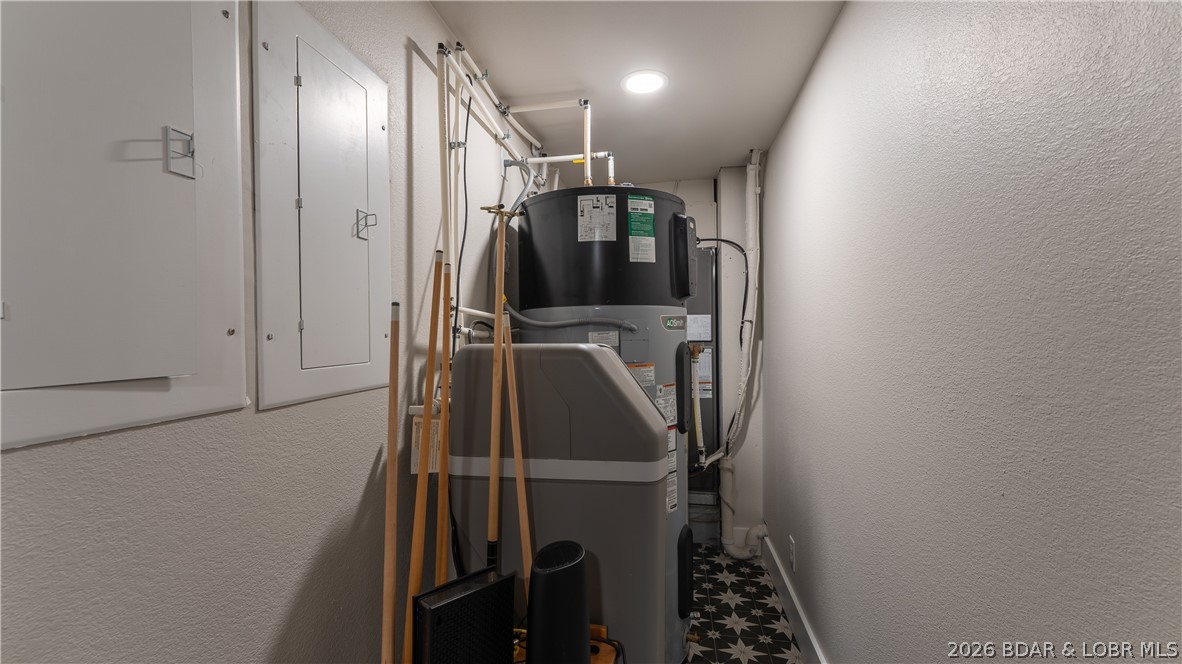 5590 Alona Point Osage Beach, MO 65065 - Photo 31 of 46 Utility Room also houses the electrical panels, wa