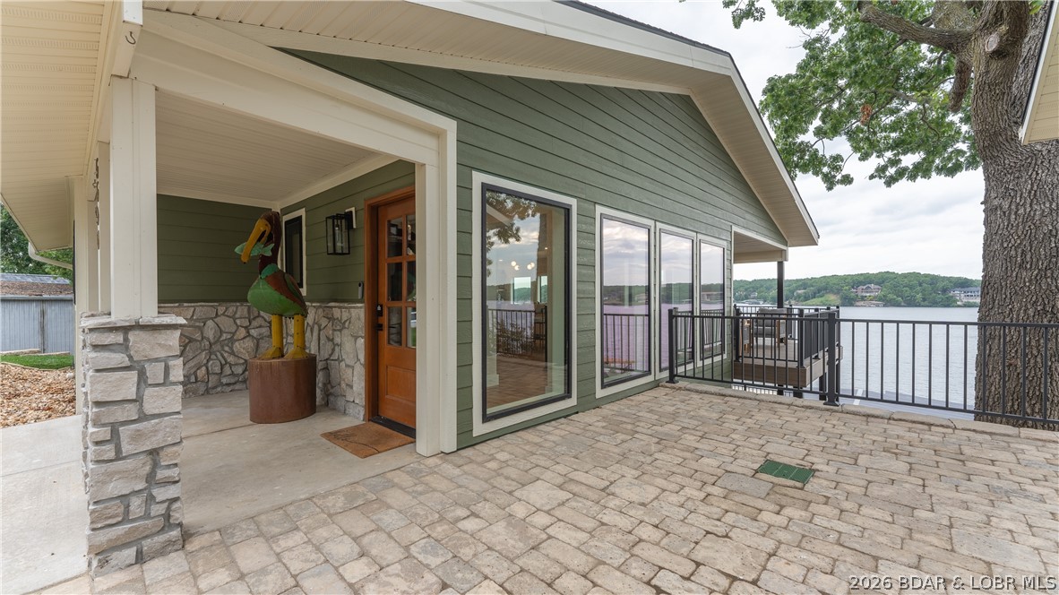 5590 Alona Point Osage Beach, MO 65065 - Photo 40 of 46 Beautiful stone patio on main level