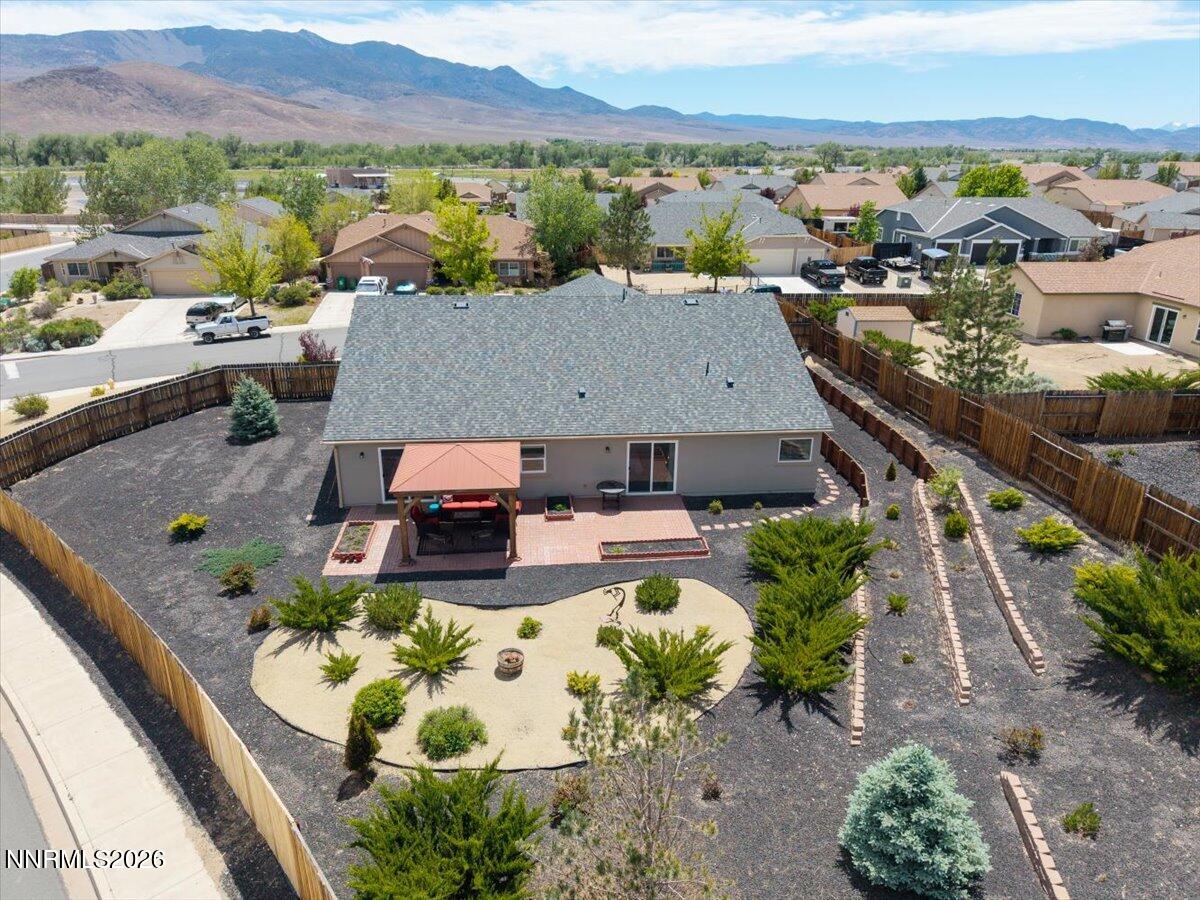 104 Bethpage Road Dayton, NV 89403 - Photo 62 of 65 a view of a terrace with a table and chairs