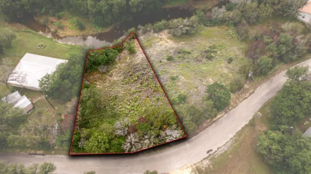 a view of a garden from a balcony