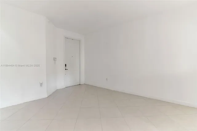 a view of room with window and ceiling fan