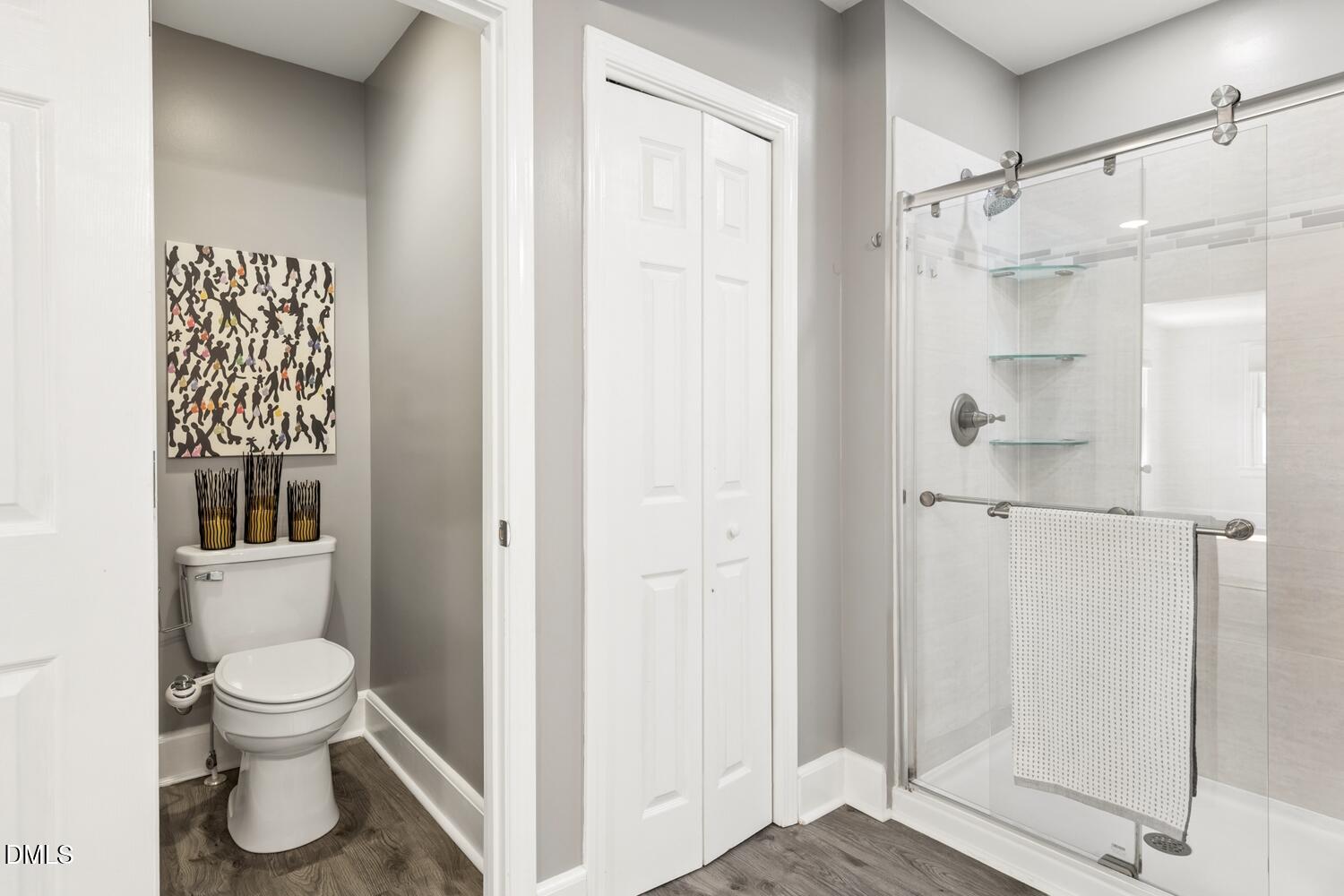 414 South Maple Street Graham, NC 27253 - Photo 16 of 42 a bathroom with a toilet and a shower