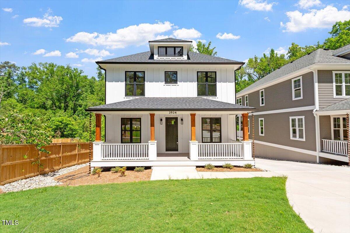 front view of a house with a yard