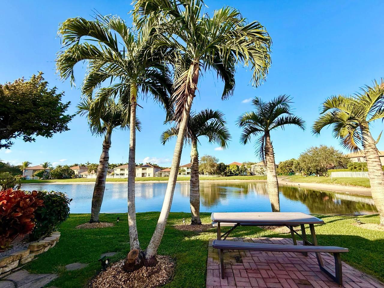 1067 Big Torch Street Riviera Beach, FL 33407 - Photo 3 of 23 a view of a ocean with outdoor space
