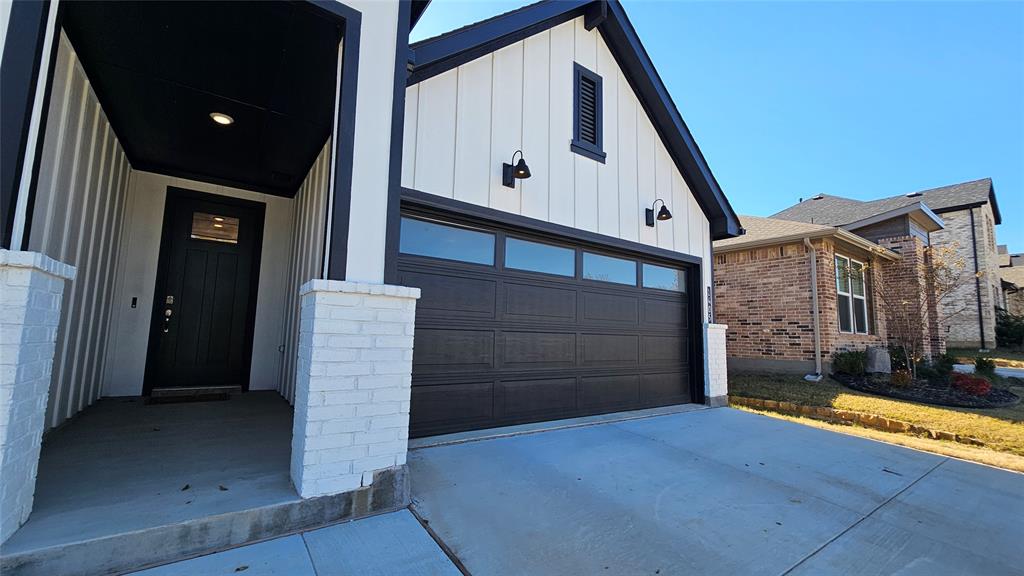 1405 Razorbill Road Denton, TX 76205 - Photo 5 of 40 a front view of a house with a yard