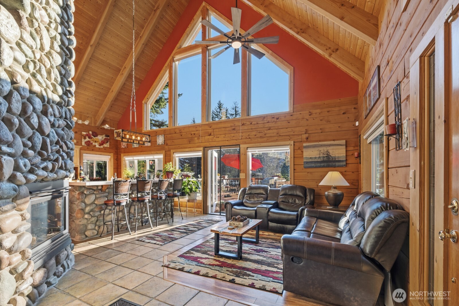 6323 North Lake Cushman Road Hoodsport, WA 98548 - Photo 12 of 40 a building outdoor space with patio furniture