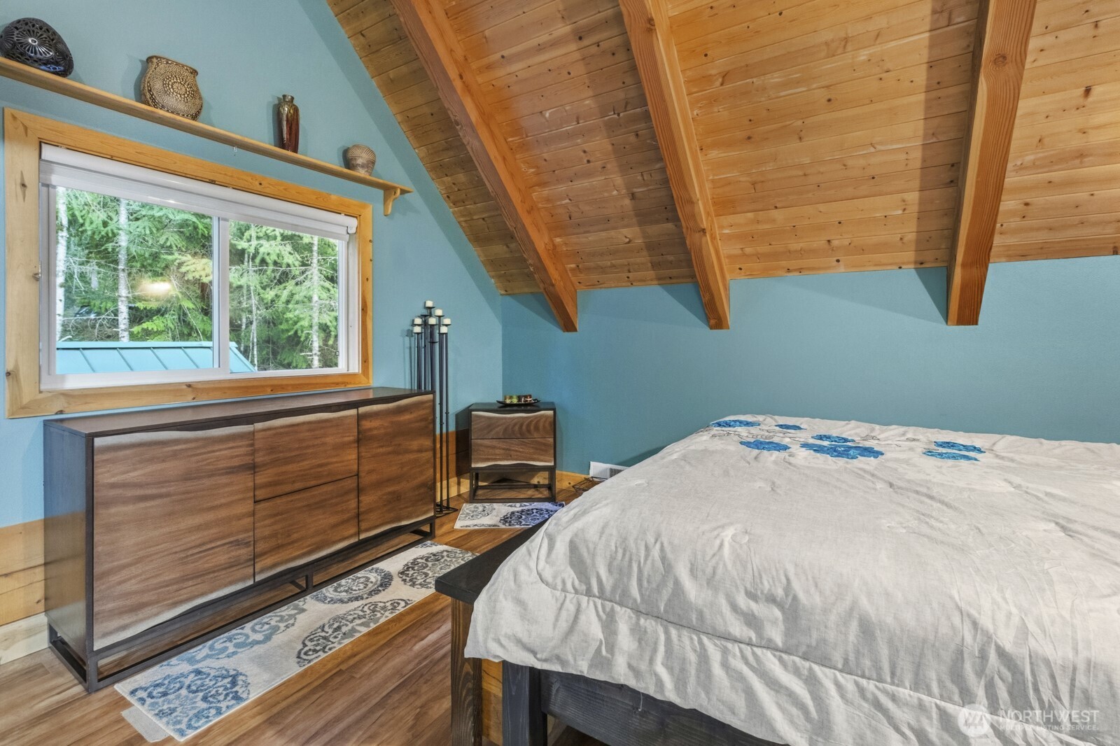 6323 North Lake Cushman Road Hoodsport, WA 98548 - Photo 29 of 40 a bedroom with a bed and a window