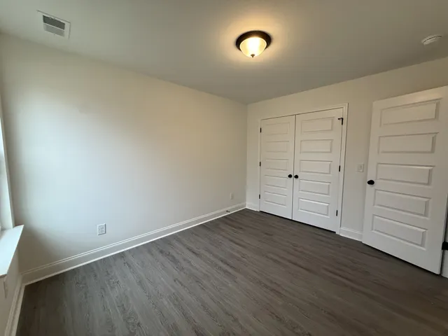 a view of house with the front door