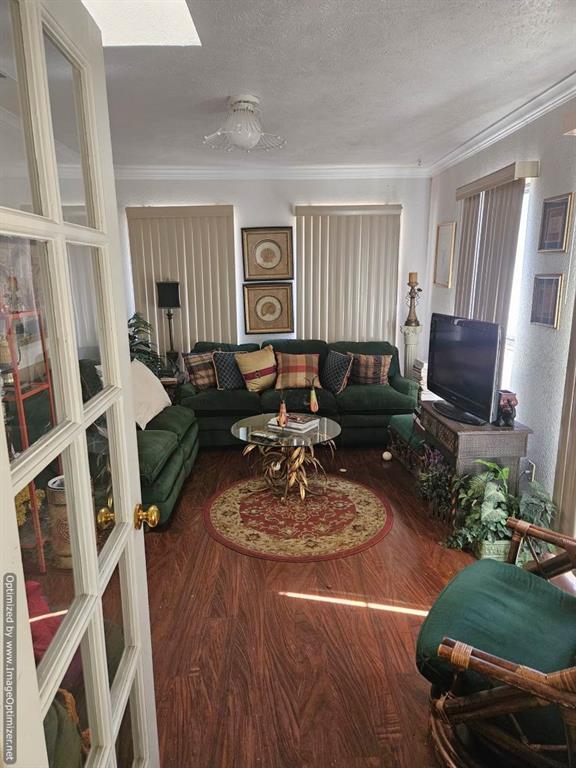7510 Ridgewick Drive Dallas, TX 75217 - Photo 12 of 21 sitting room or 3rd living room is accessible from main living room and the primary bedroom