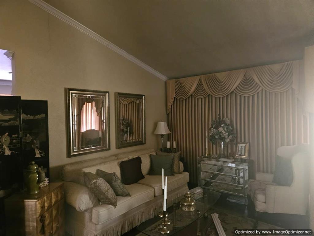 7510 Ridgewick Drive Dallas, TX 75217 - Photo 6 of 21 Living room at front entry