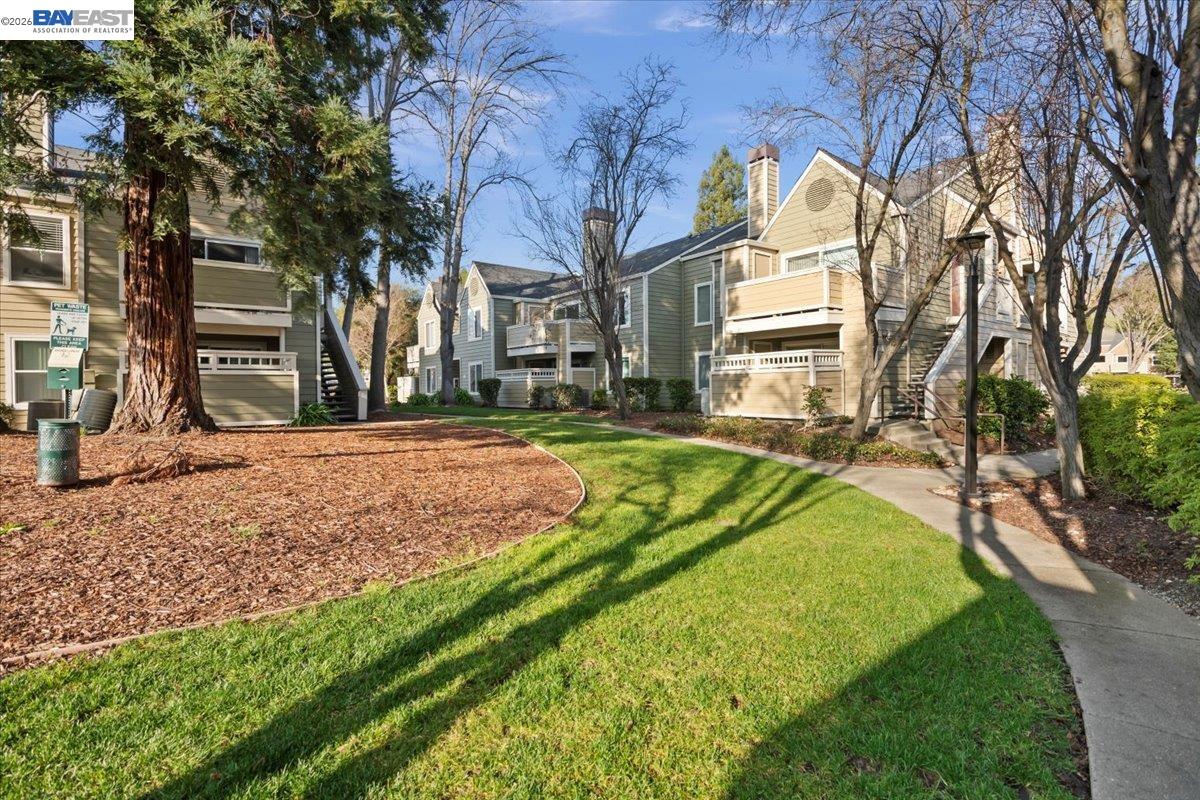 215 Reflections Drive, Unit 16 San Ramon, CA 94583 - Photo 17 of 17 a view of a house with a yard
