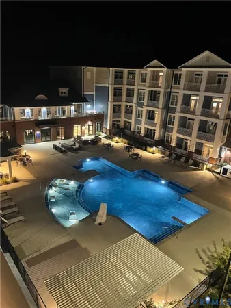 a front view of a house with swimming pool