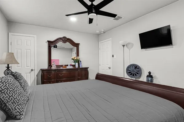 a living room with a couch and a flat screen tv