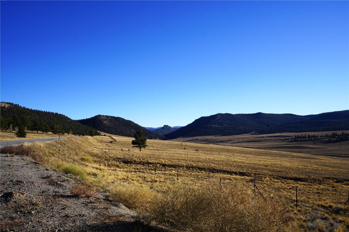 Tbd Black Beaver Road Hartsel, CO 80449 - Photo 15 of 22 a view of an lake with mountains in the background