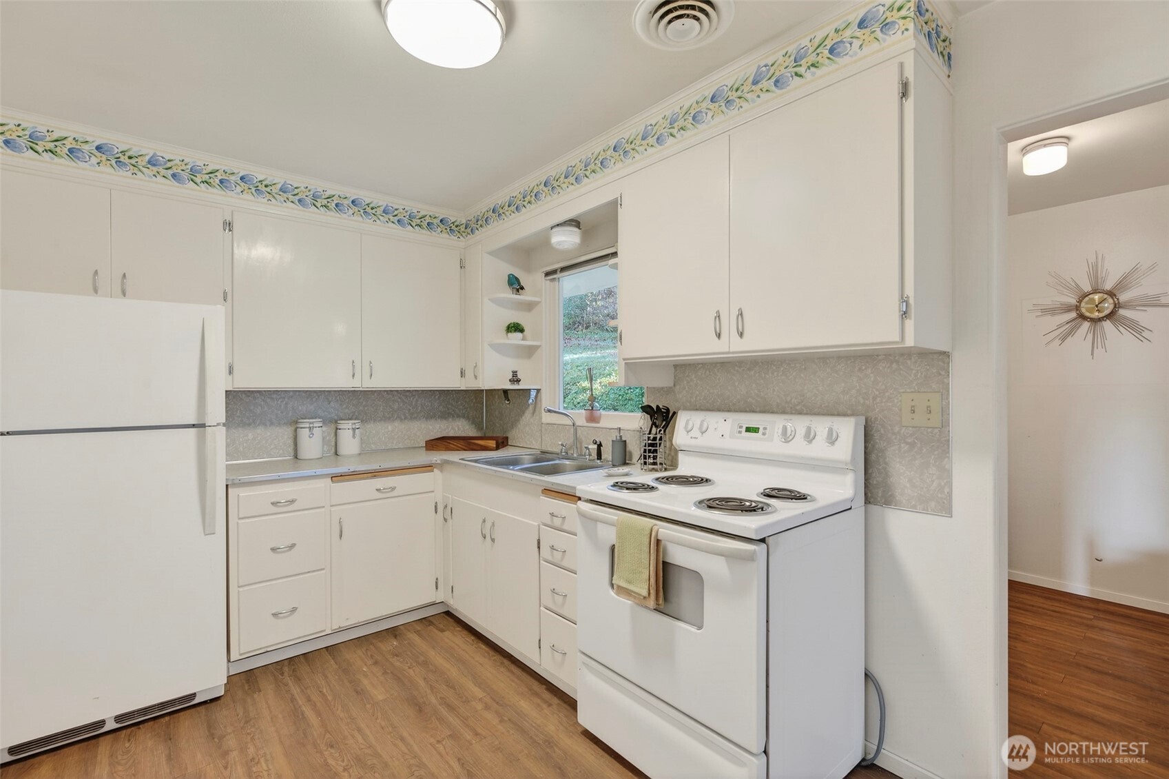 312 Southeast 2nd Street Winlock, WA 98596 - Photo 12 of 40 a kitchen with appliances cabinets and a counter top space