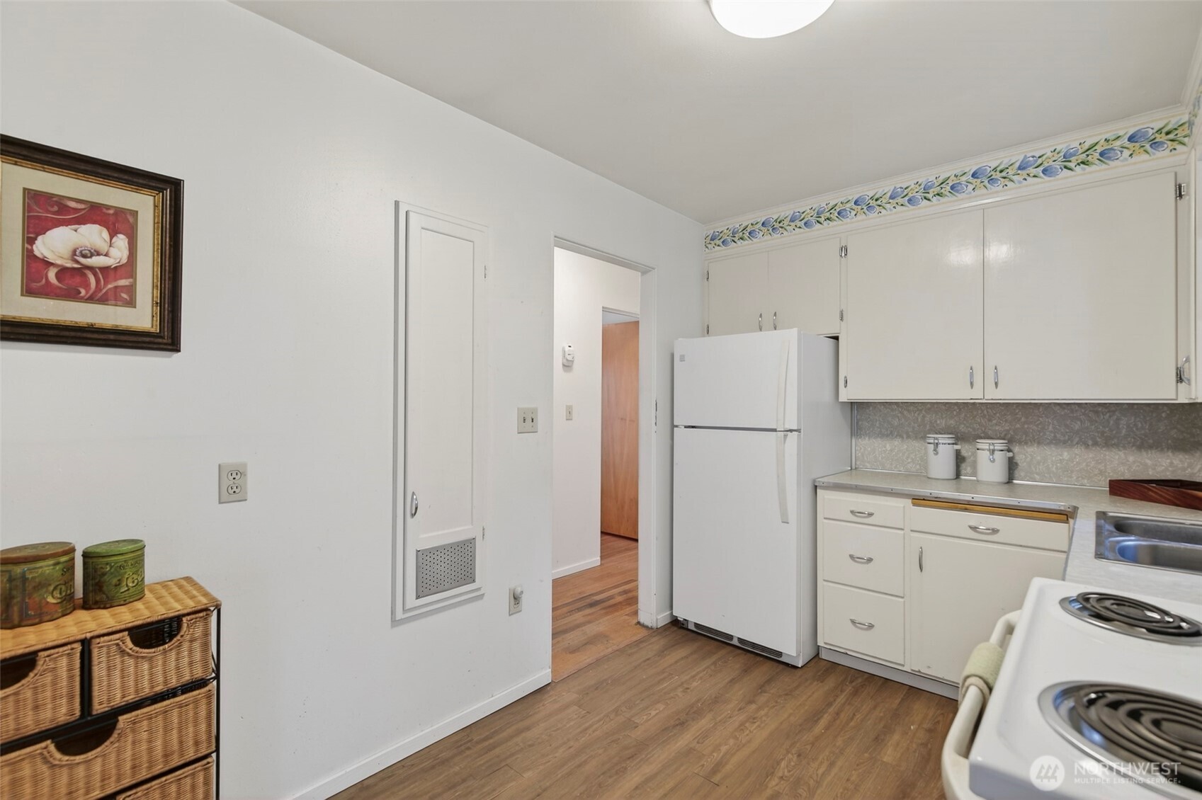 312 Southeast 2nd Street Winlock, WA 98596 - Photo 14 of 40 a view of kitchen with wooden floor