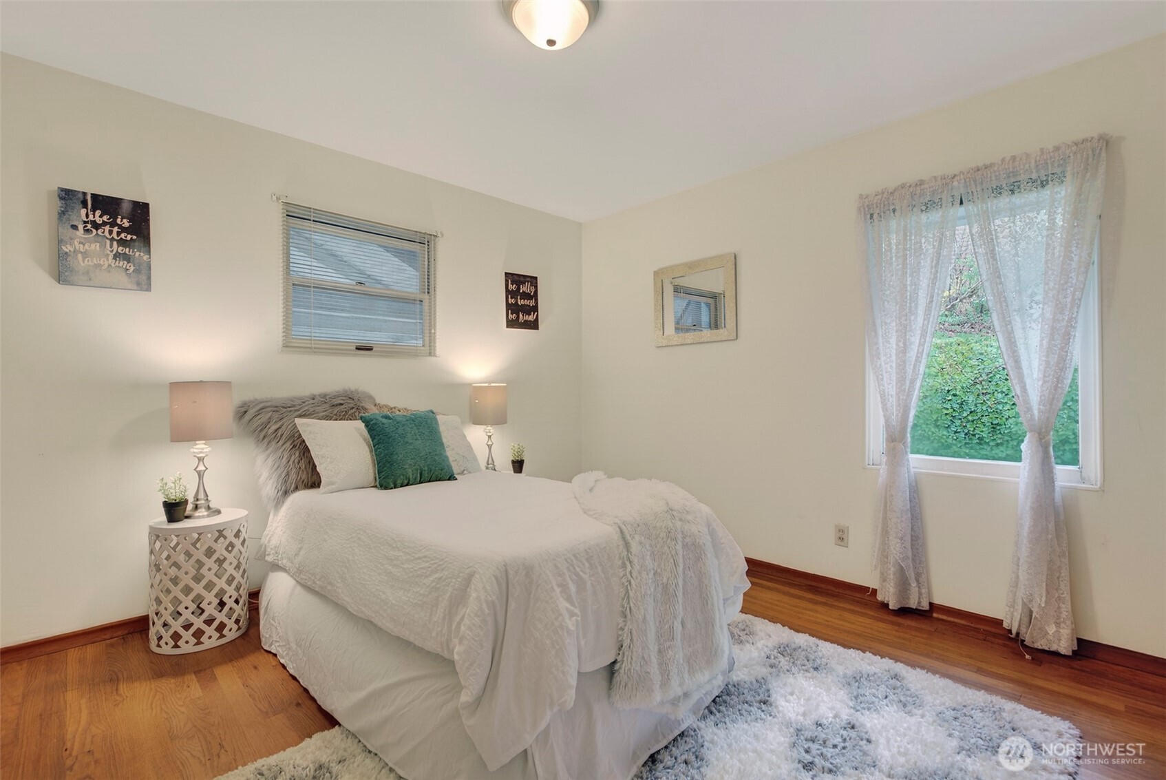 312 Southeast 2nd Street Winlock, WA 98596 - Photo 23 of 40 a bedroom with a bed and a window