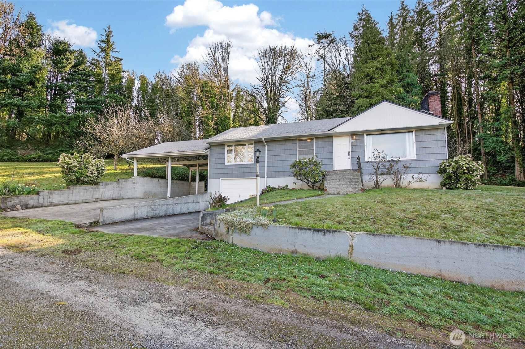 312 Southeast 2nd Street Winlock, WA 98596 - Photo 32 of 40 a view of a house with yard and a garden