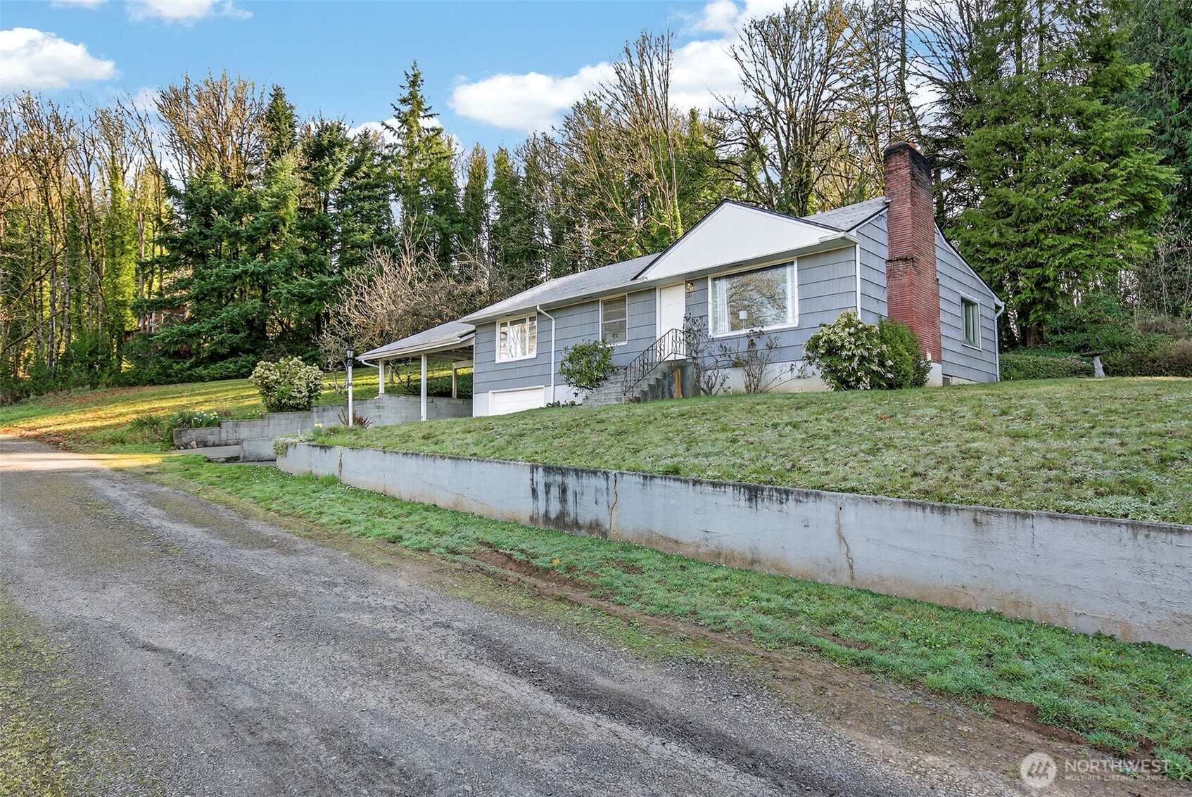 312 Southeast 2nd Street Winlock, WA 98596 - Photo 33 of 40 a front view of a house with garden