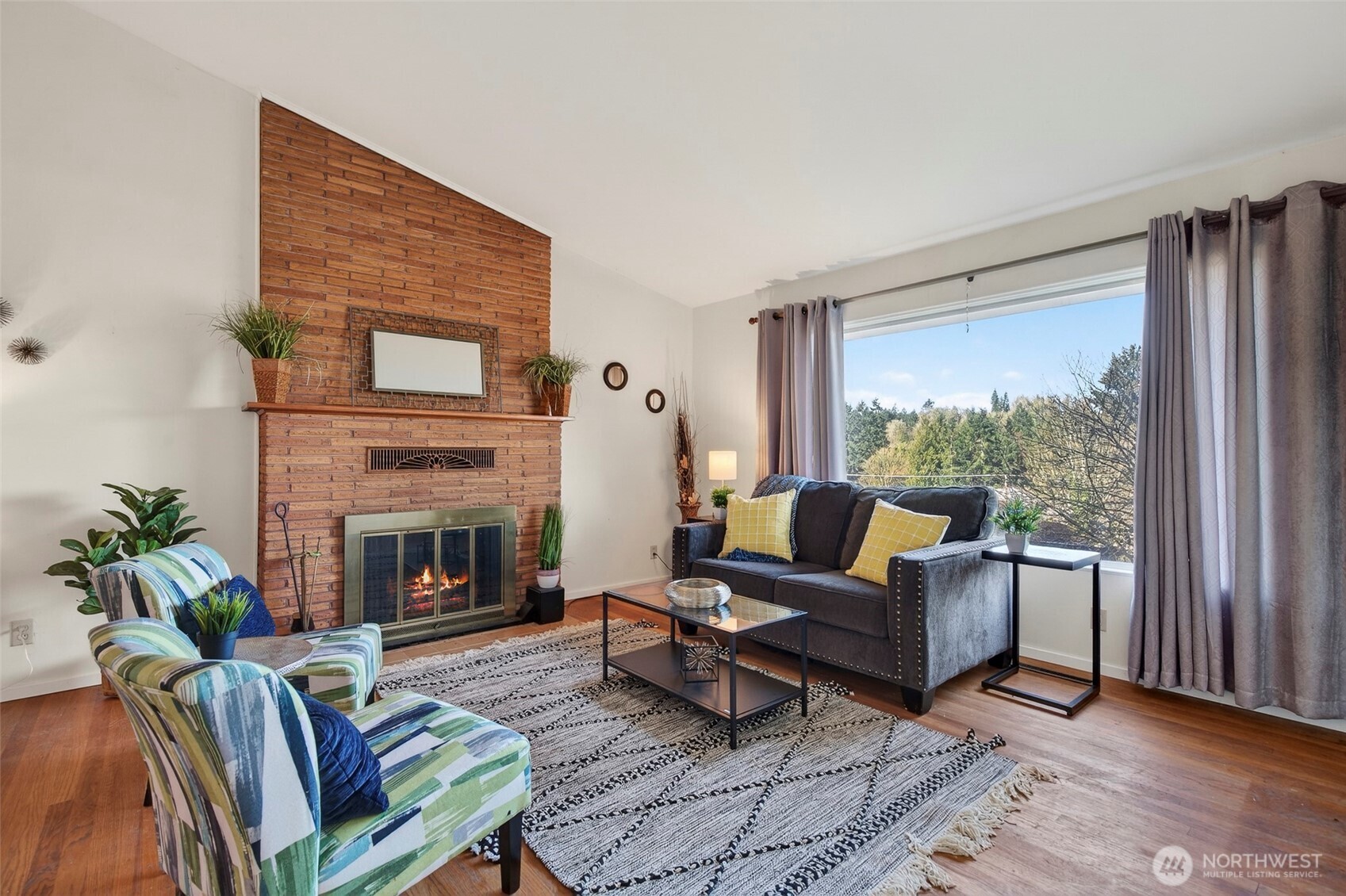 312 Southeast 2nd Street Winlock, WA 98596 - Photo 5 of 40 a living room with furniture and a fireplace