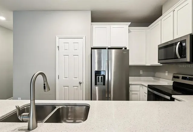 a view of a livingroom with wooden floor