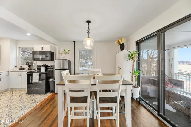 a view of a dining room with furniture